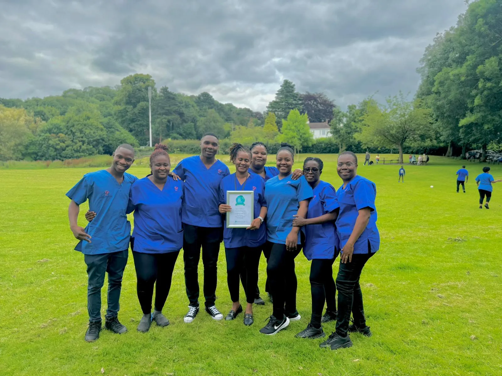 TKS Staffing carers celebrating their homecare.co.uk Top 20 award with the certificate