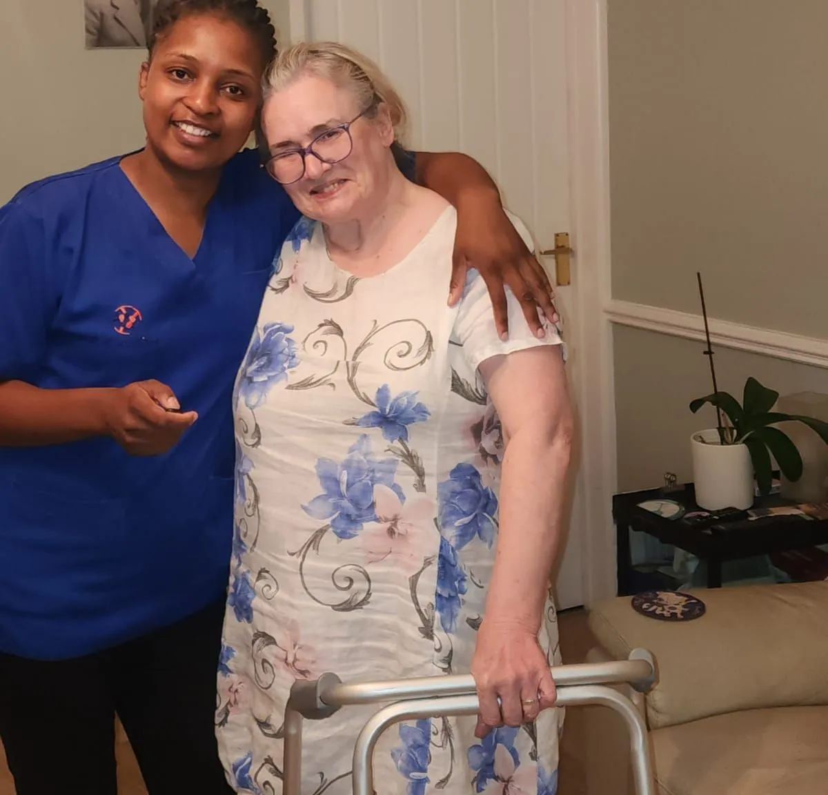 TKS Staffing carer serving breakfast to a client during a morning personal care visit in Derbyshire